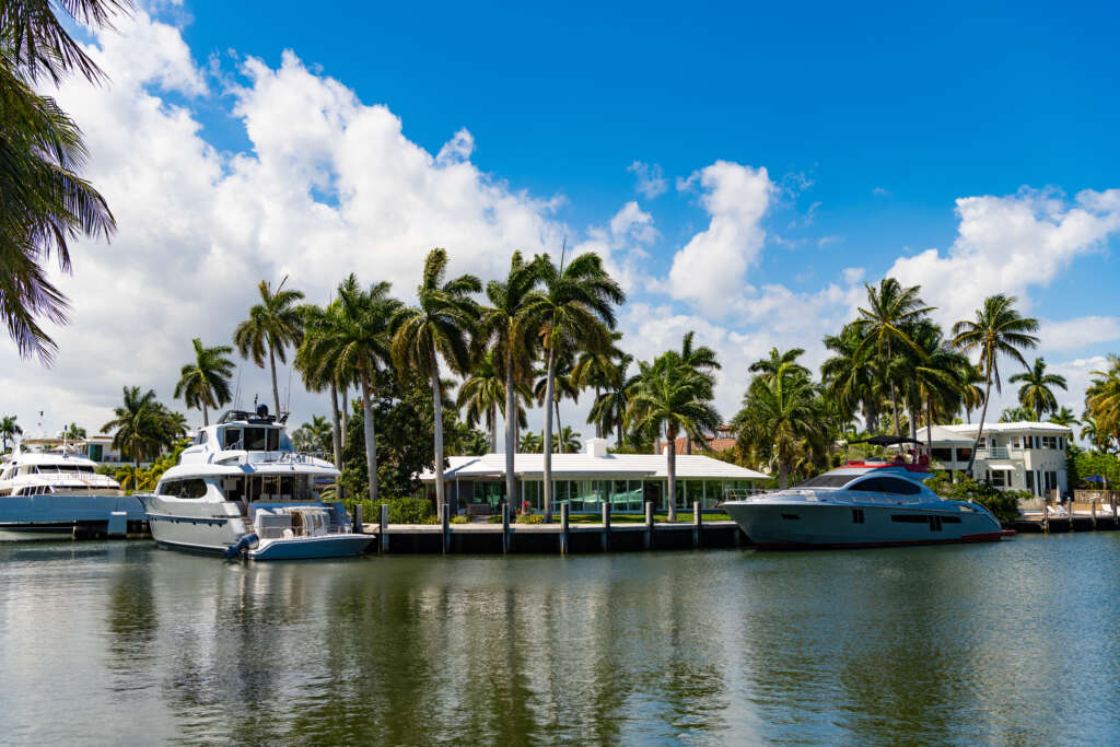 enjoying summer vacation on boat in the sea with villa. summer vacation with a speed boat yacht. summer vacation. yacht boat. summer holidays on luxury yacht.
